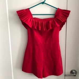 Red off the shoulder ruffled romper